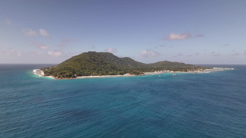 Landscape of an intense island surrounded by the blue ocean