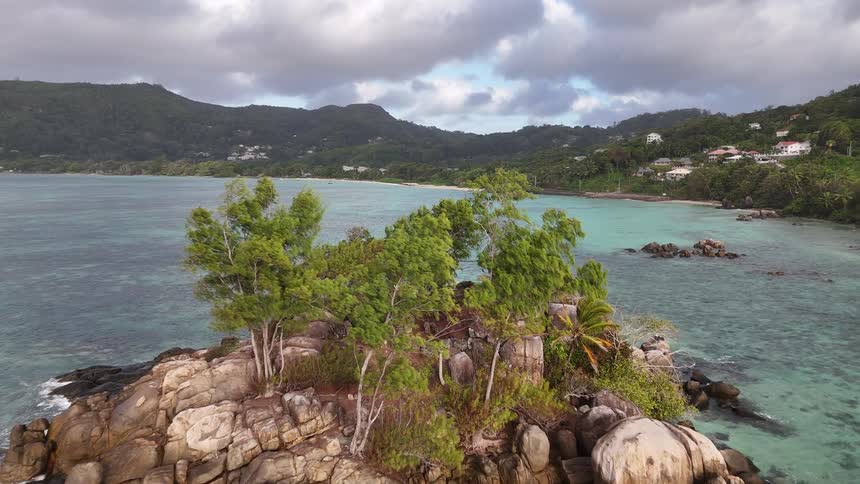Landscape of a small island in an archipelago surrounded by mountains