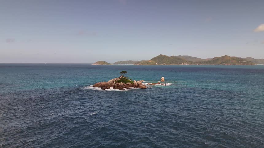 Tropical islands are in the blue waters