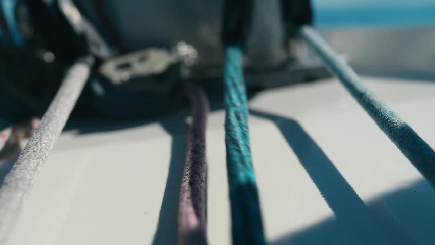 Closeup of ropes on a moving boat