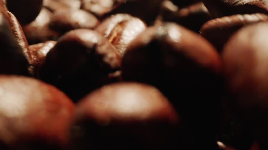 The coffee beans bounce when they fall