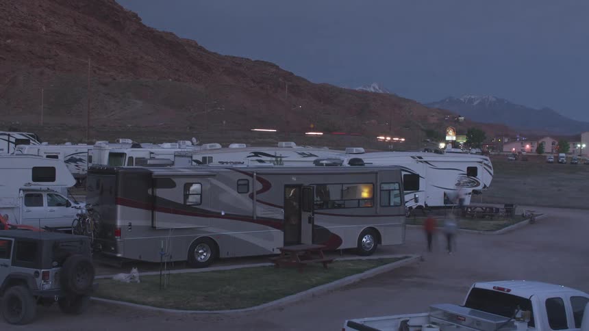 An rv park next to a highway