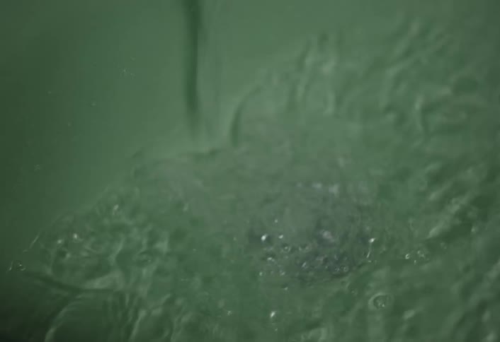 Water falling into a bathtub