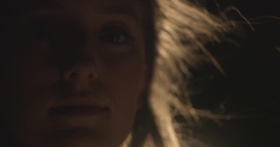 The girl looks down