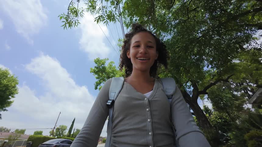 A girl is traveling and smiling