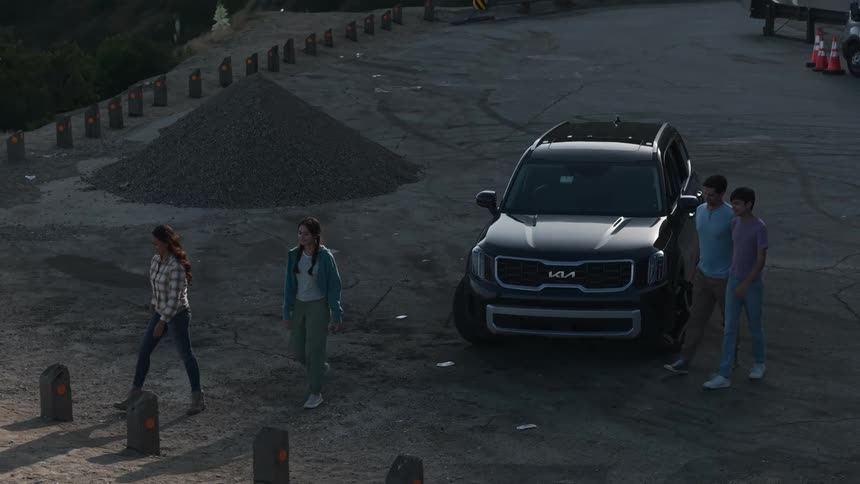 Family getting out of a car in a high mountain area