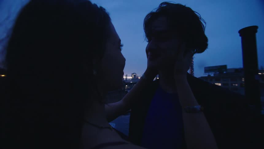 Couple on a terrace kissing