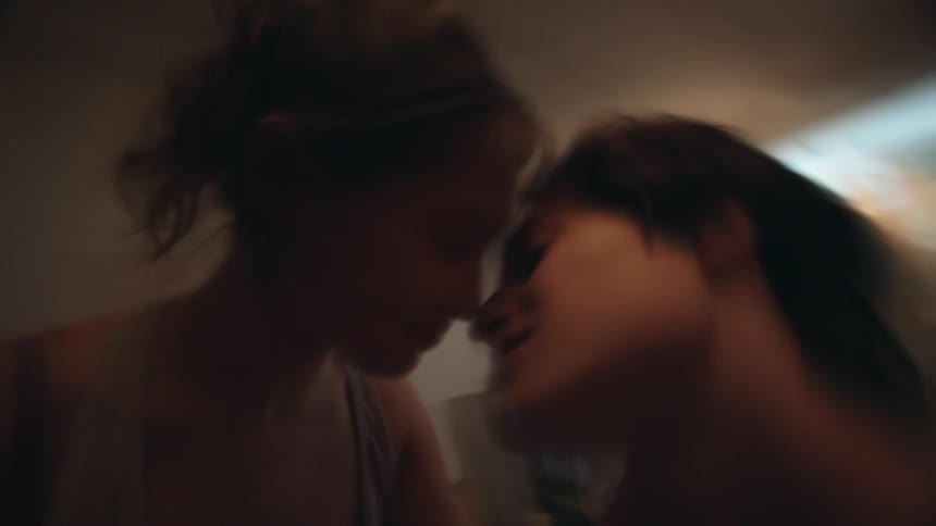 A couple are making out in the room