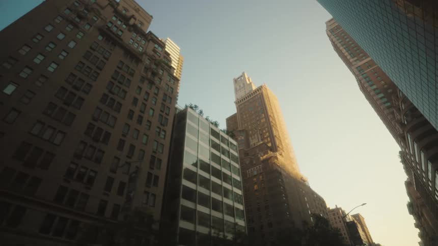 High rise buildings in a metropolitan city street during daytime