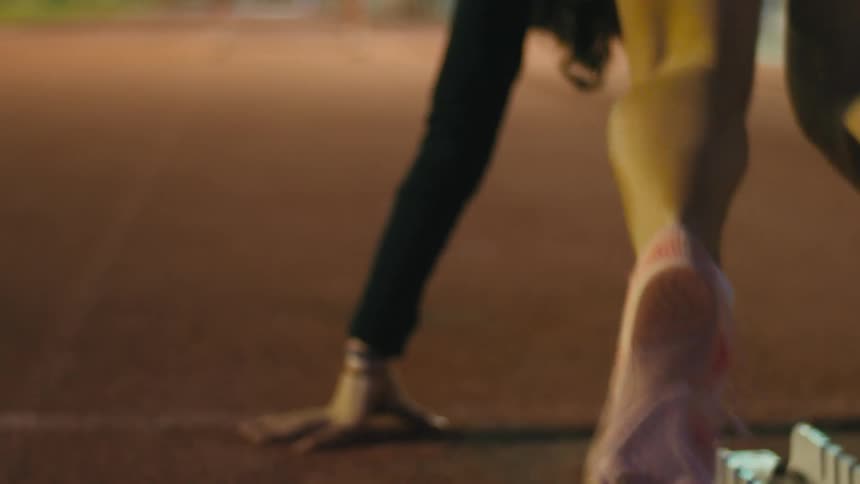 A woman races on the track