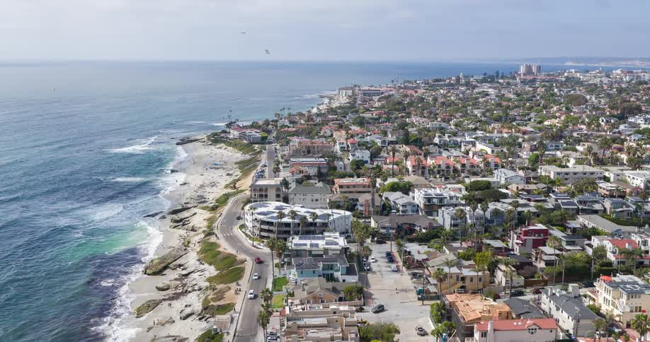 Urban city on the edge of a long beach