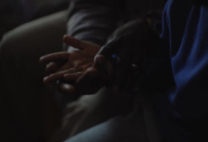Palms of two peoples hands together