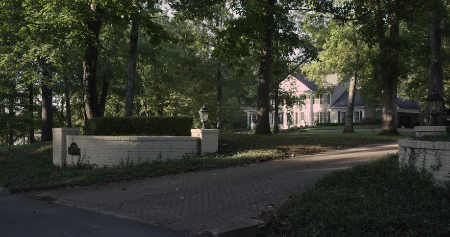 Suv car turning the street and entering a residential area