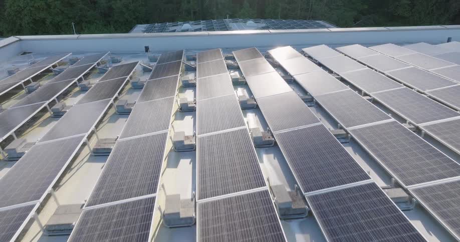 Solar panels cover multiple rooftops of a LEED certified office building
