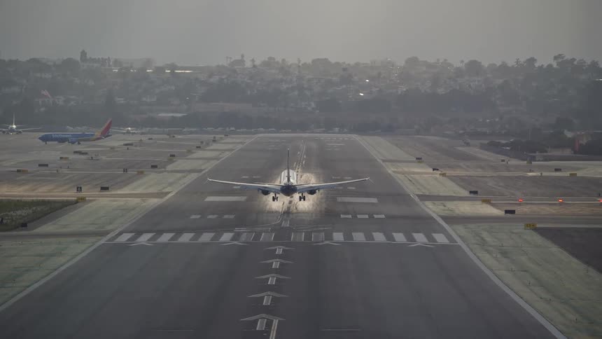 Large plane landing at the airport