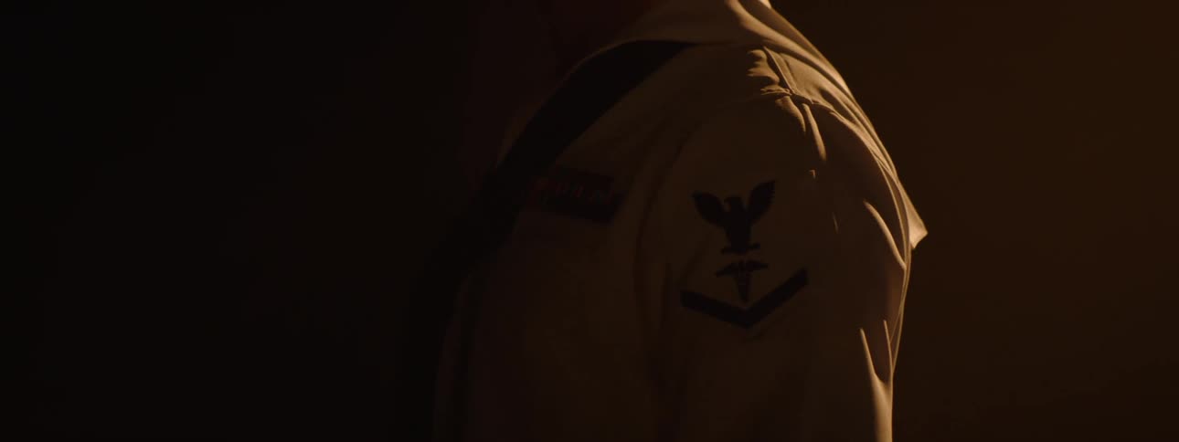 The sailor is turning in the dark