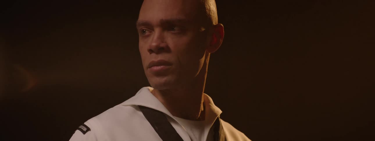 The sailor slowly blinks his eyes