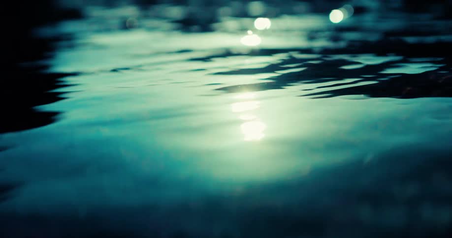 Reflection of the sun in the calm waters of a river