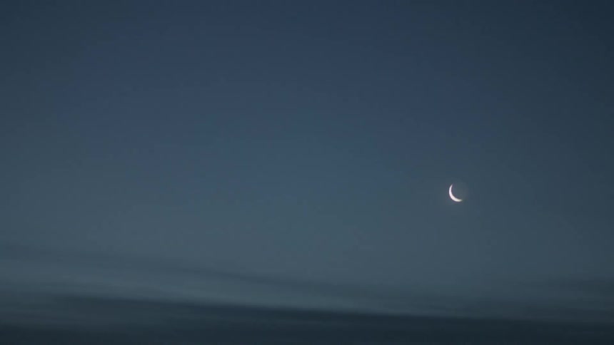 A crescent moon in the sky
