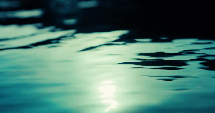 Sunlight reflects on the ocean water at sunset