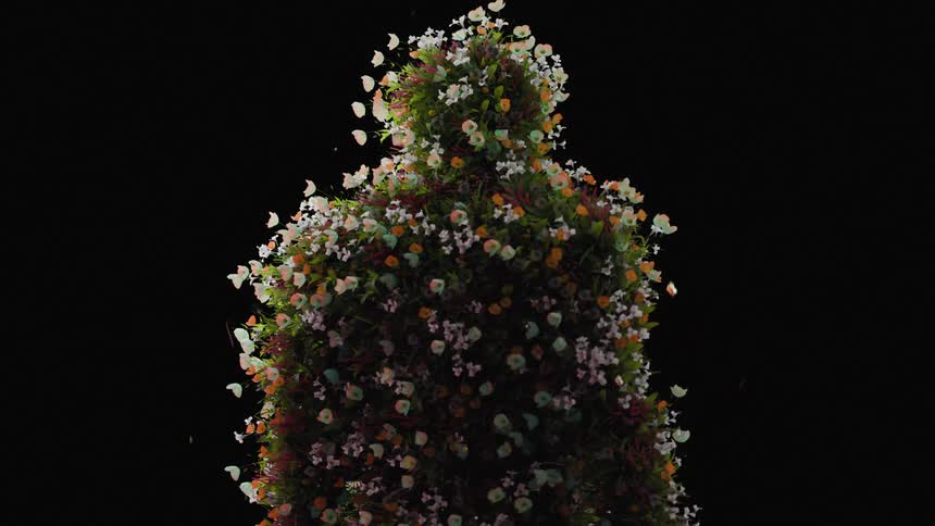Colorful flowers form an abstract silhouette of a person against a black background