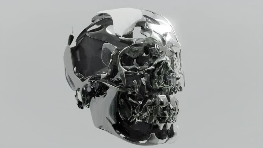 Abstract metallic skull against a neutral white background