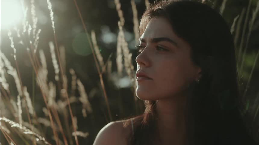 Close up portrait of a young woman outdoors during daytime