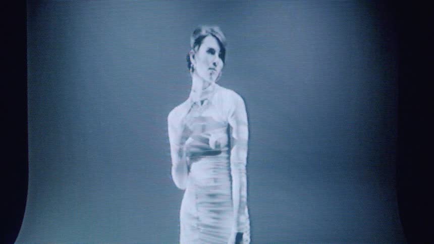 The video features an abstract somewhat distorted image of a woman possibly a digital representation or a reflection with subtle movements the image is set against a background of horizontal lines reminiscent of a television screen or an old monitor