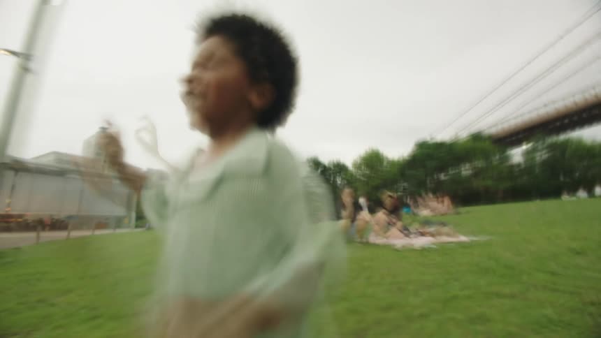 The child is running through the park