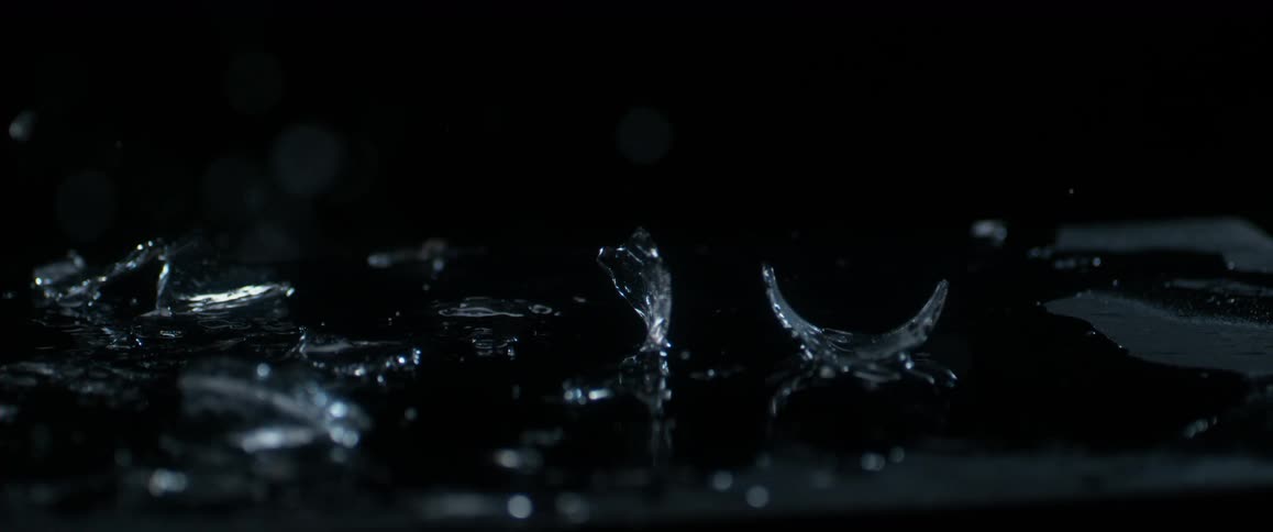 Water and glass bounce on a surface