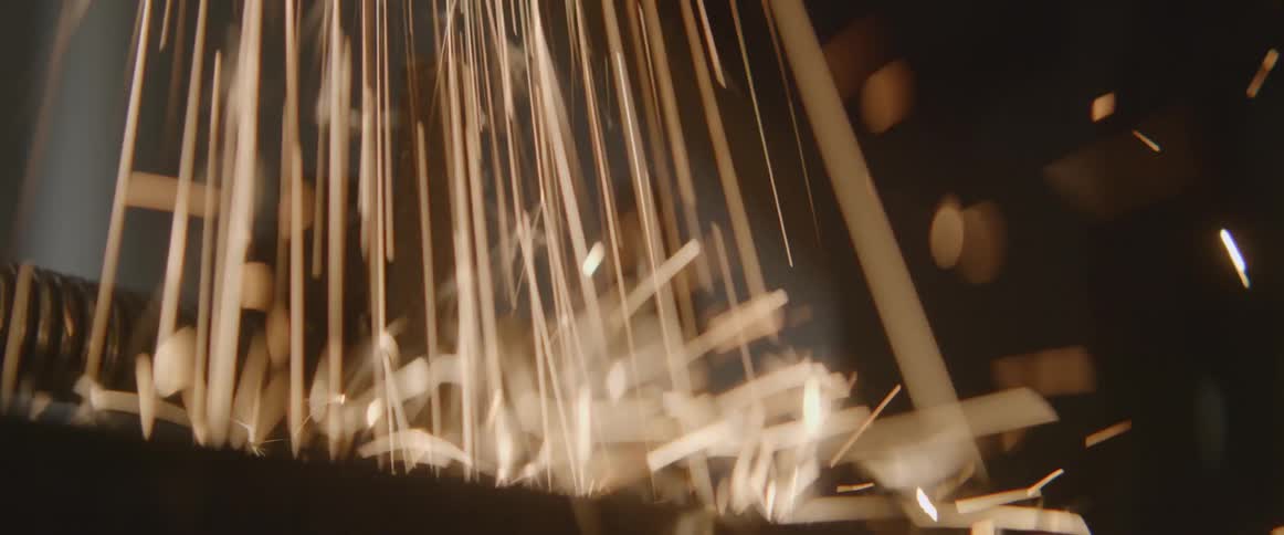 A shower of sparks hit the ground
