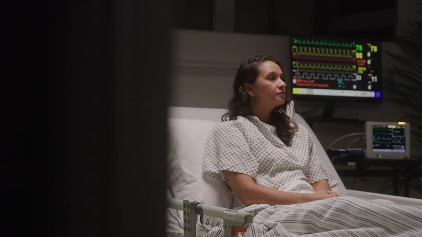 Girl lying in a hospital bed