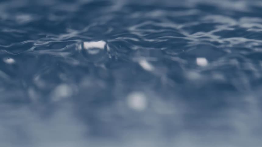 Extreme close up of the surface of boiling water