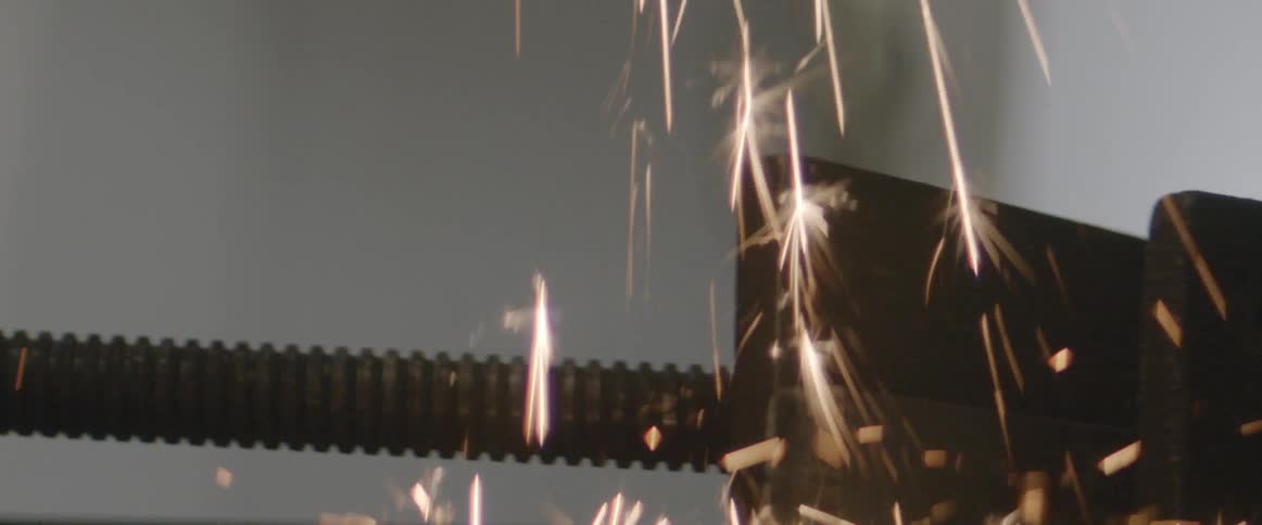 Sparks fall on a machine
