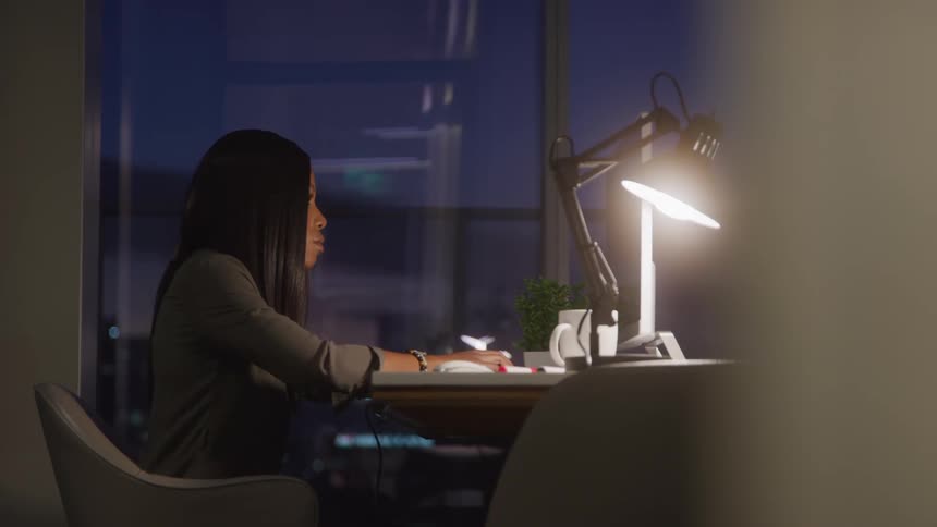 A footage of a person working on a laptop
