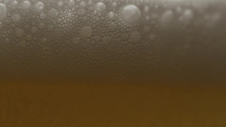 Zoom in on a glass of beer