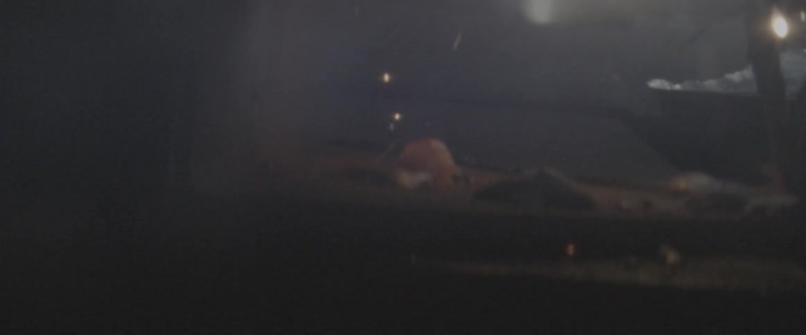 Sparks fly in a dark room