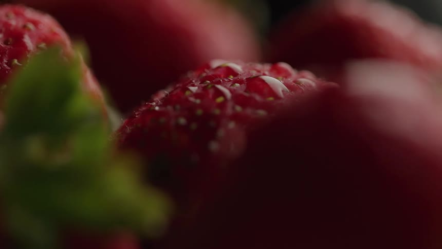 Close up of fresh strawberries with water droplets