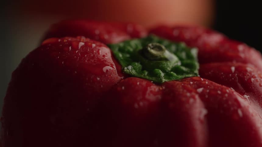 A recently washed ripe tomato