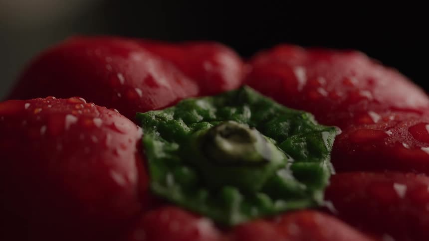 Red bell pepper with water droplets on the surface
