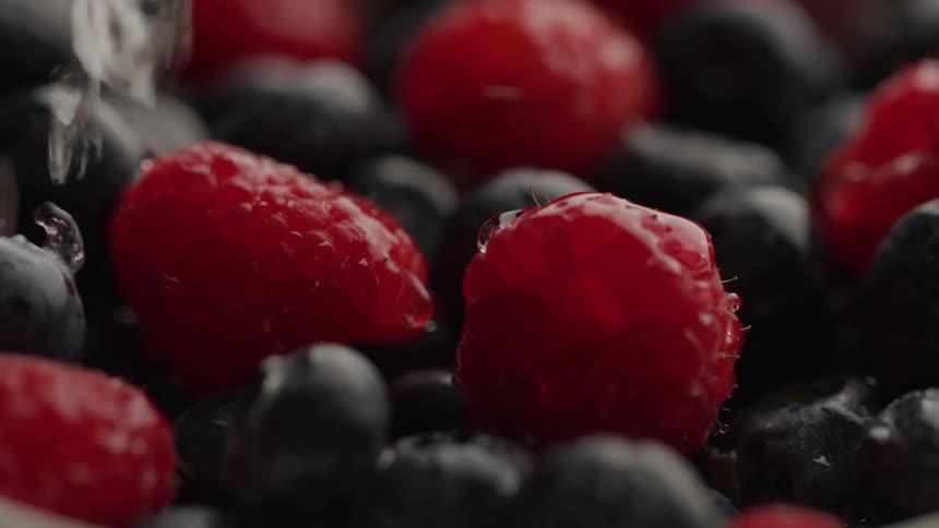 Water is poured over the berries