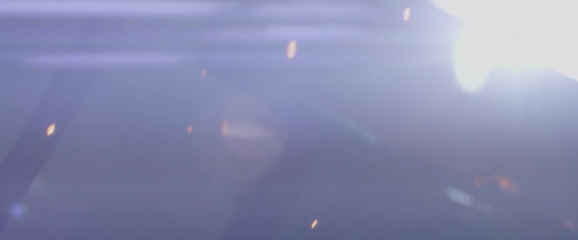 Sparks and smoke fly through the air as an object is welded