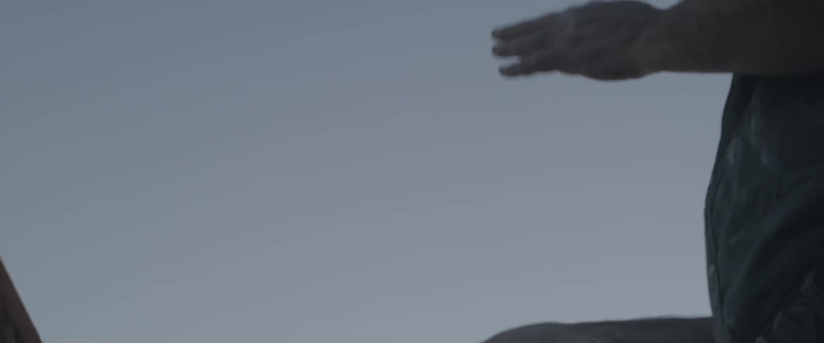 Person wiping their hands together