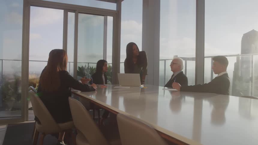 People are talking during the meeting in the conference room