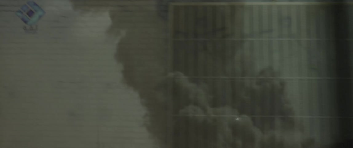Army artillery shoots rounds with smoke in the distance