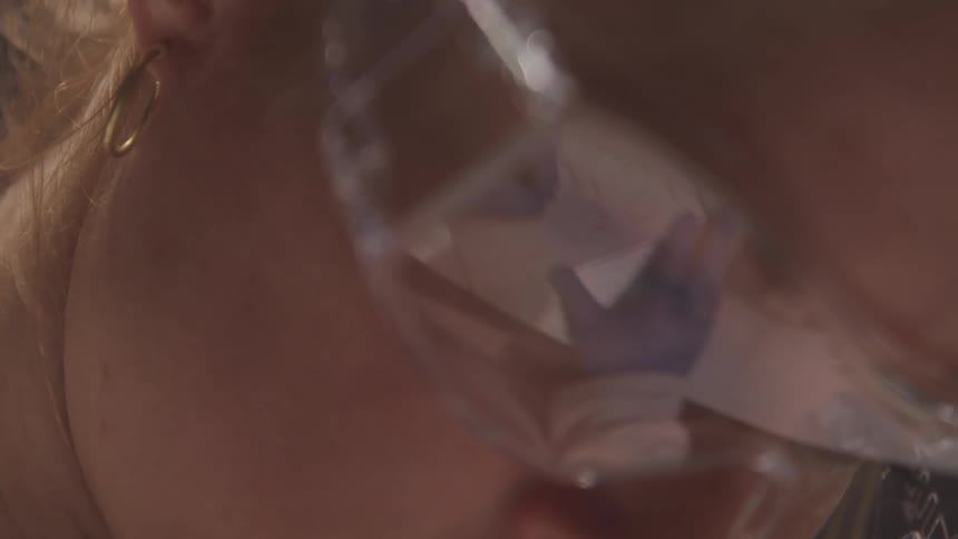 Zoom on the face of a girl in a laboratory