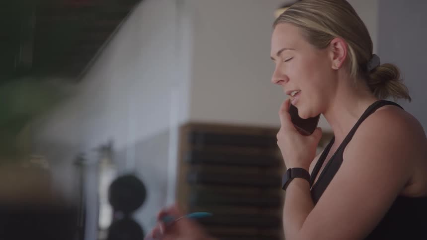 Blonde woman talking on the phone