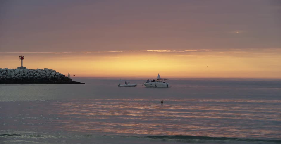 Horizon with boats at sea in the late afternoon