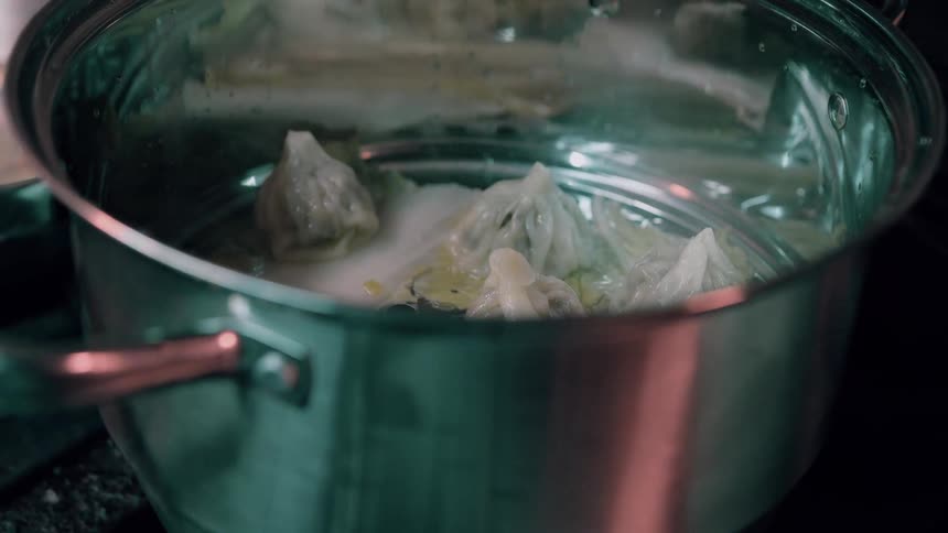 Dumplings are steaming in the pot