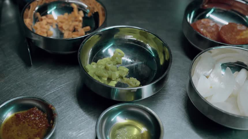 Tiny dishes have different garnishes and sauces